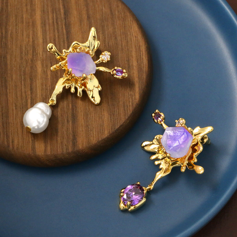 amethyst and pearl earrings On Table