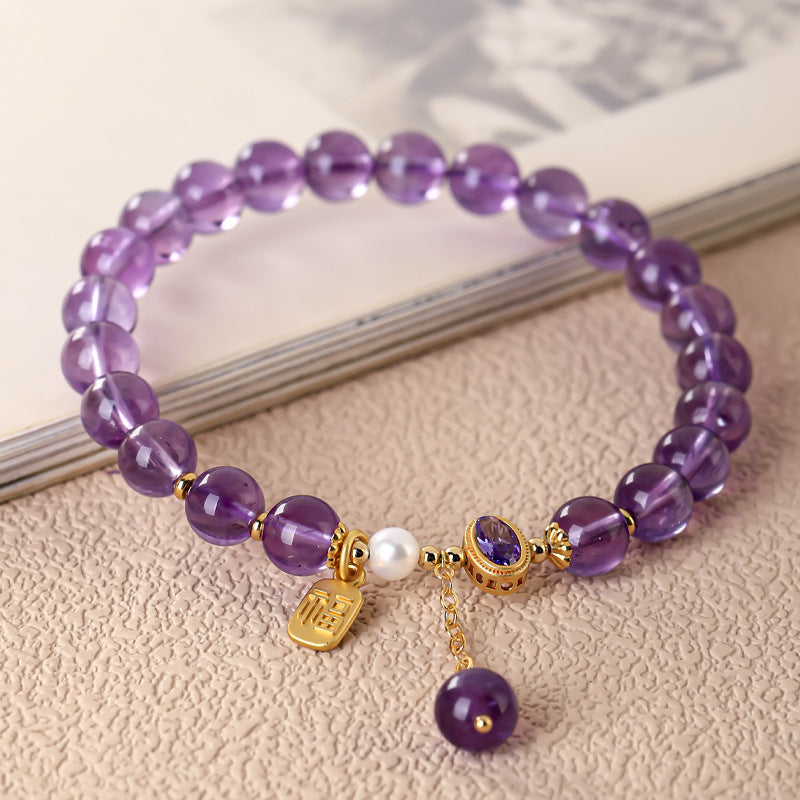 Amethyst bracelet On Table