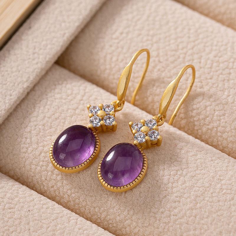 amethyst drop earrings On Table