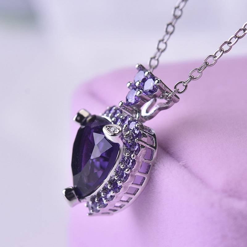 amethyst heart necklace with pink background