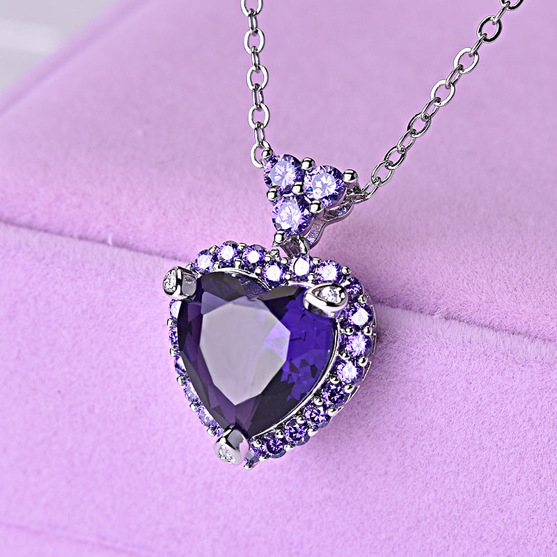 amethyst heart necklace with pink background