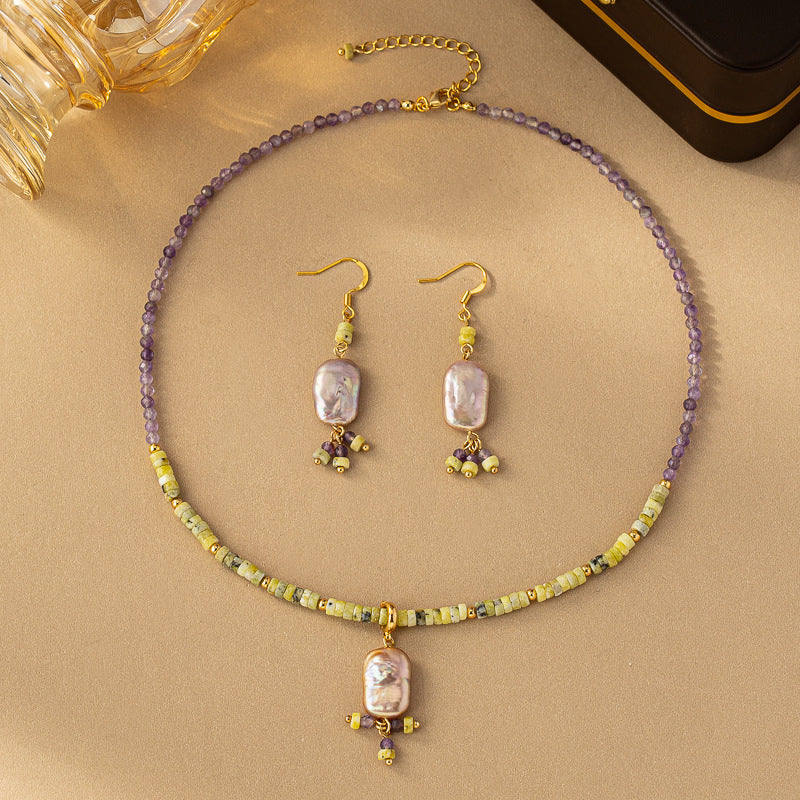 amethyst necklace and earring set wheat background