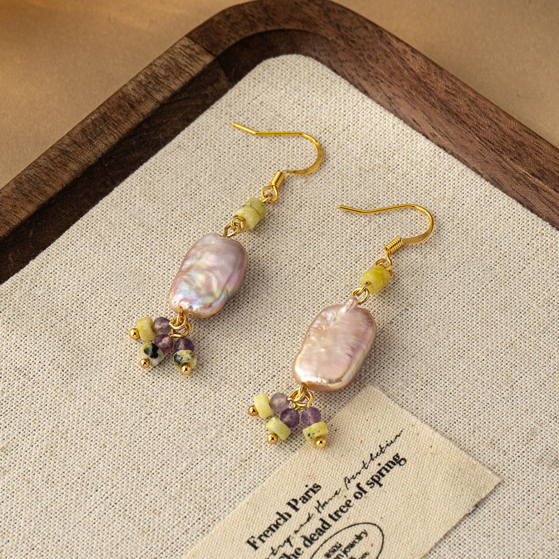 amethyst necklace and earring set On Table