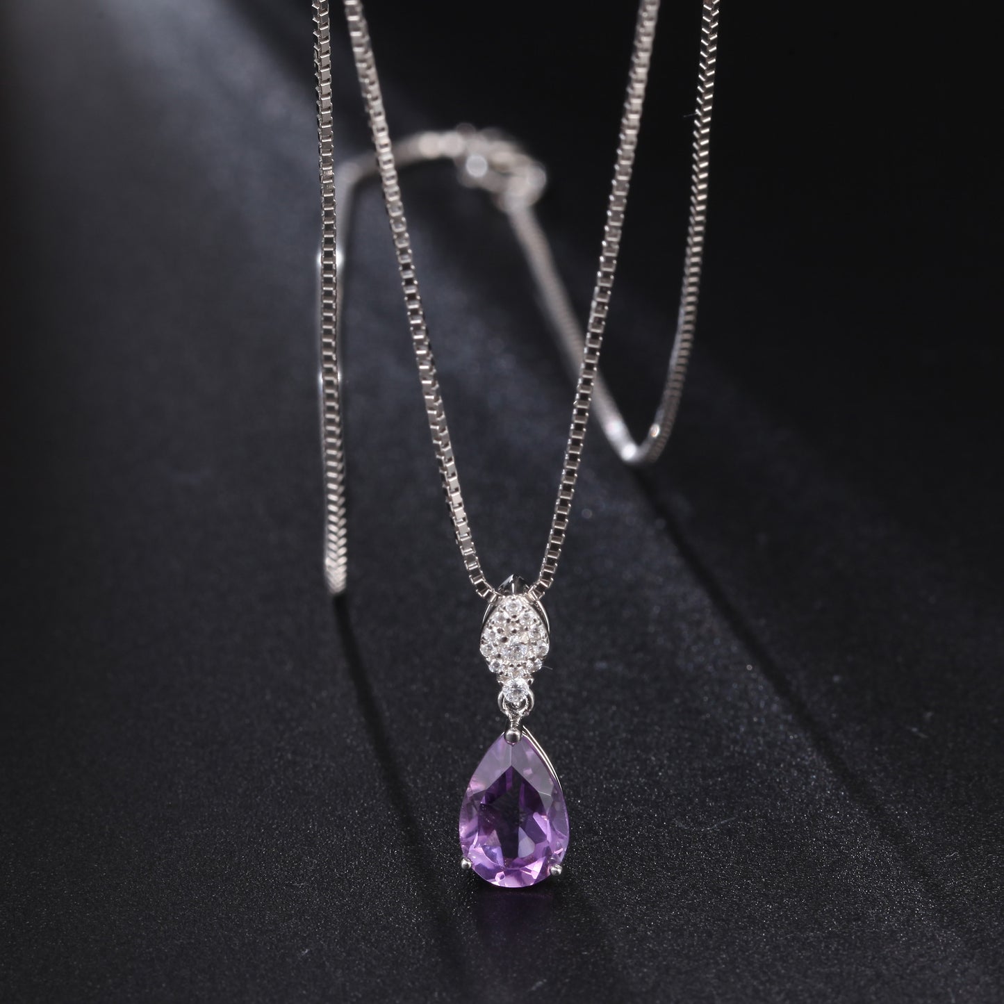 amethyst heart necklace black background