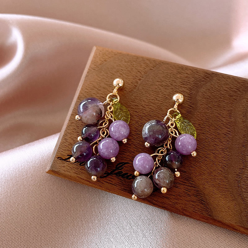Amethyst Stud Earrings With bronze background