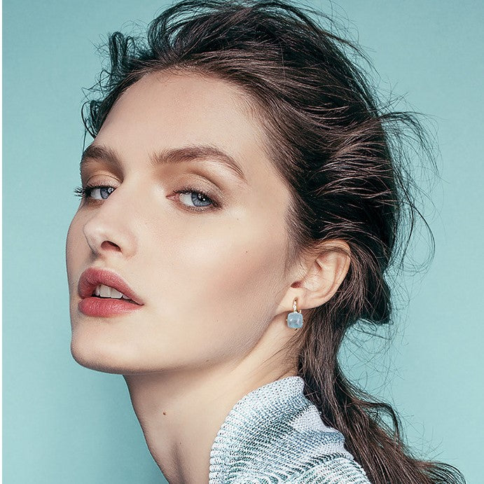 Aquamarine Earrings With a Woman