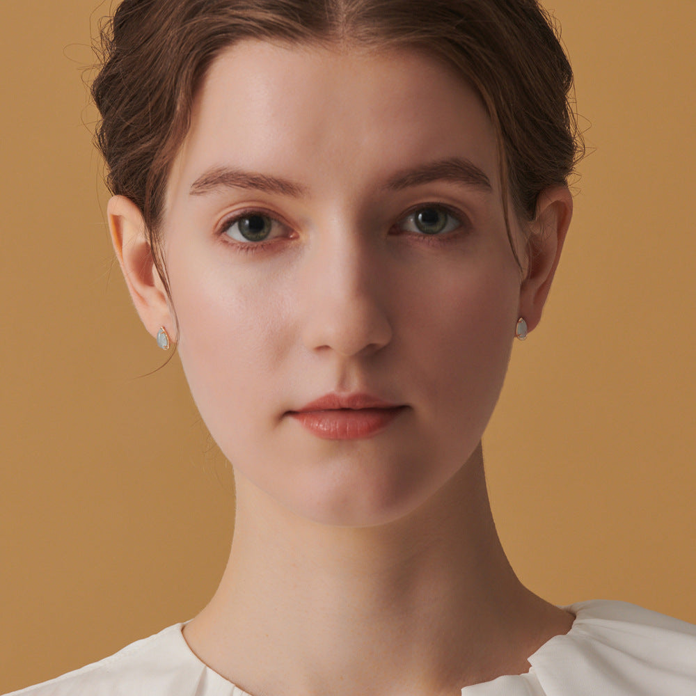 Aquamarine Earrings worn by a girl