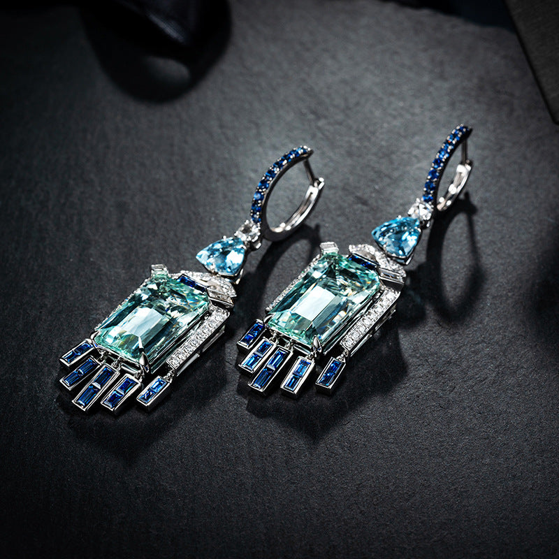 Aquamarine Hoop Earrings with black background
