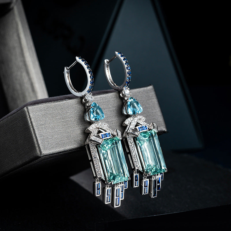 Aquamarine Hoop Earrings with black background