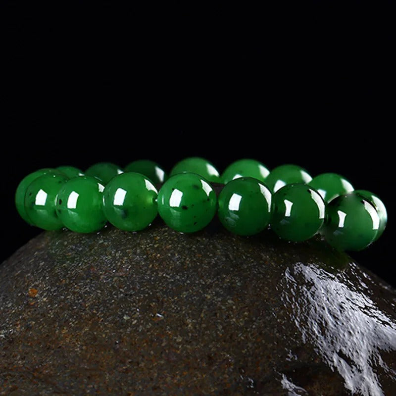 Jade Beaded Bracelet on the rock