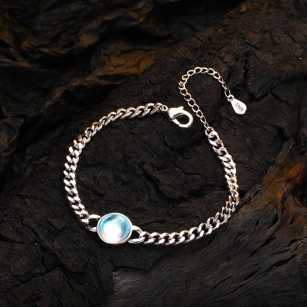 Moonstone bracelet on wooden.
