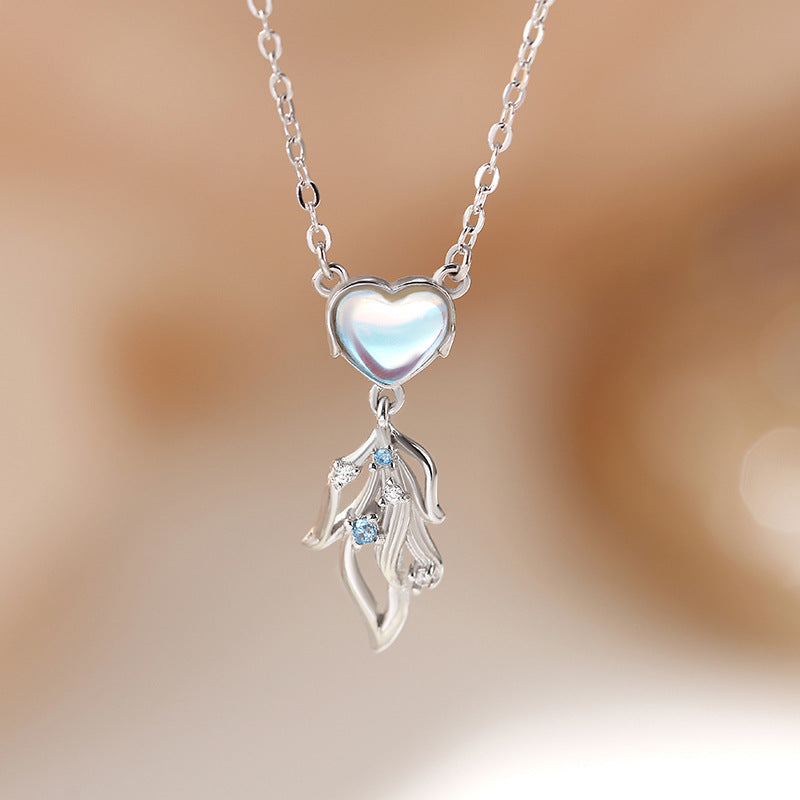 moonstone heart necklace gray background