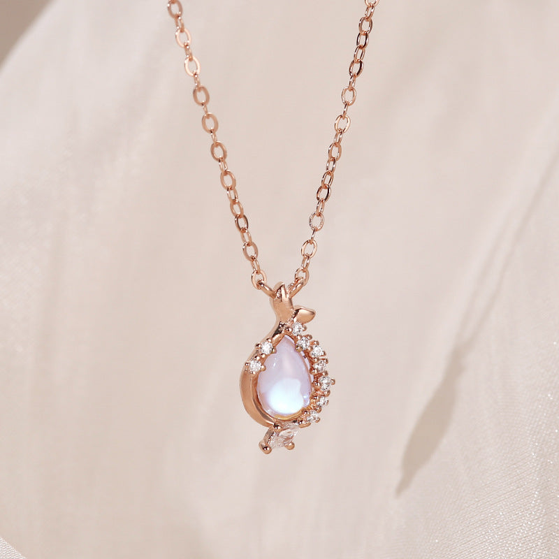 moonstone pendant necklace with On Table