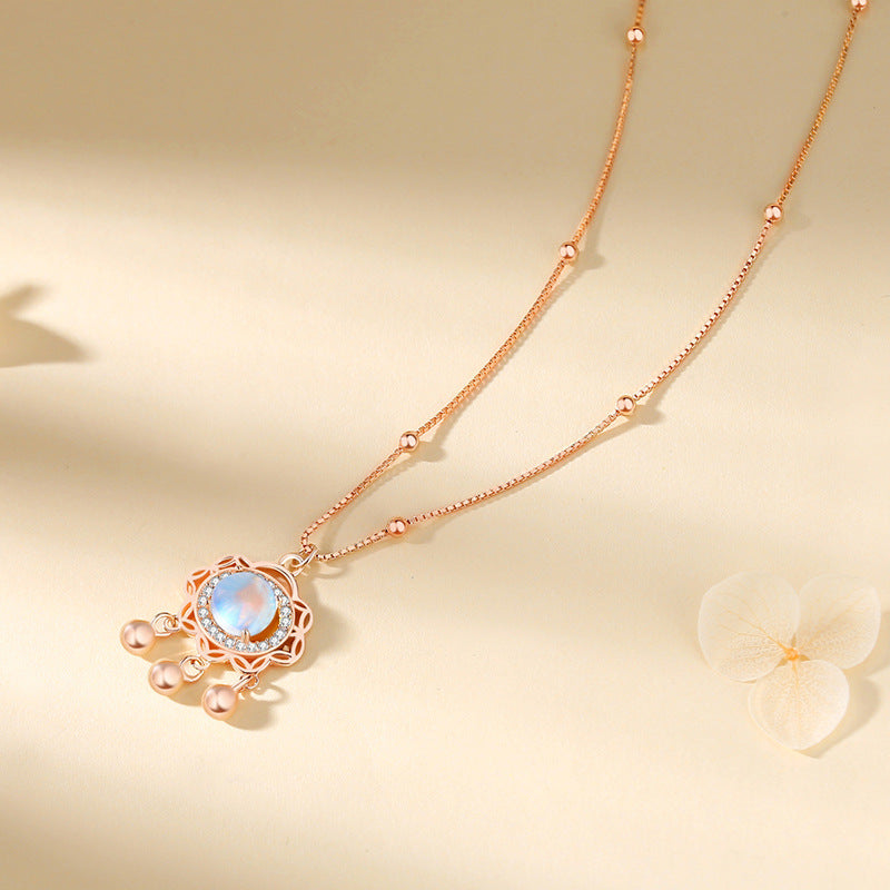 vintage moonstone necklace with gold background