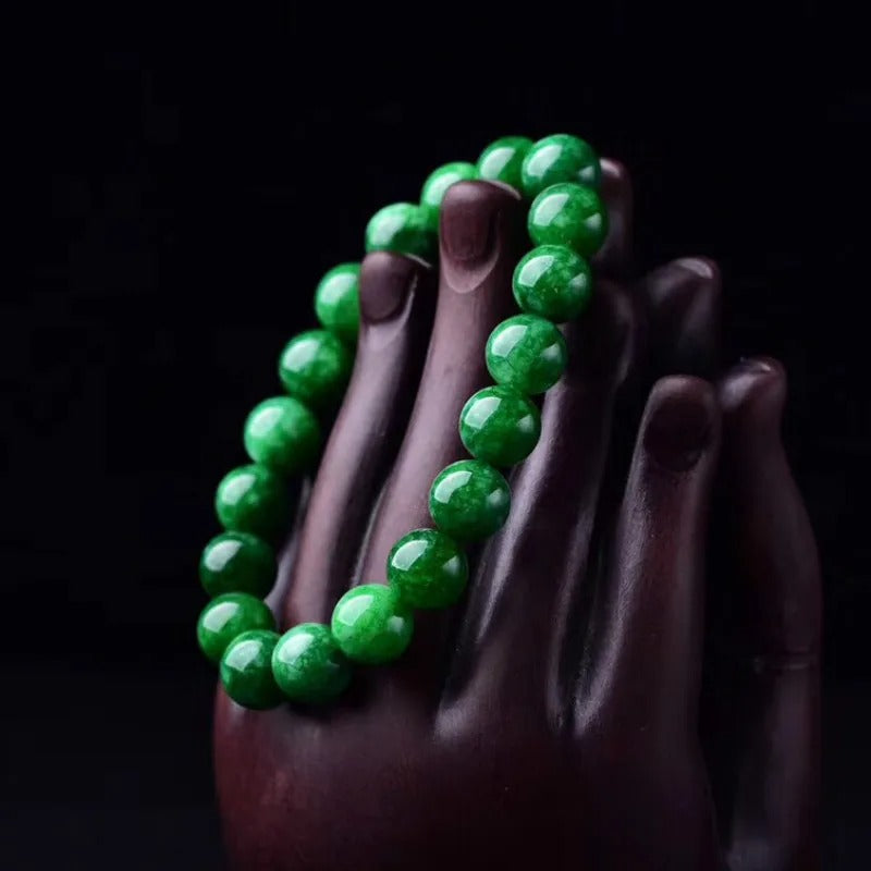 green jade bracelet on the wood 1