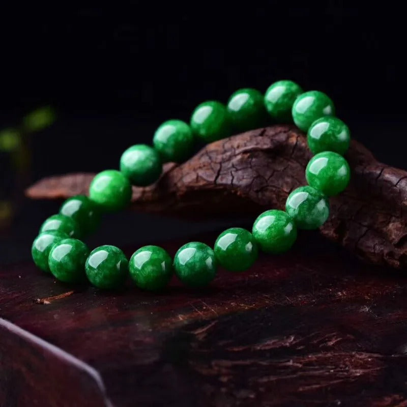 green jade bracelet on the wood 2