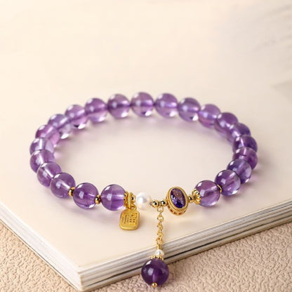 Amethyst bracelet On Table
