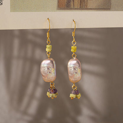 amethyst necklace and earring set gray background