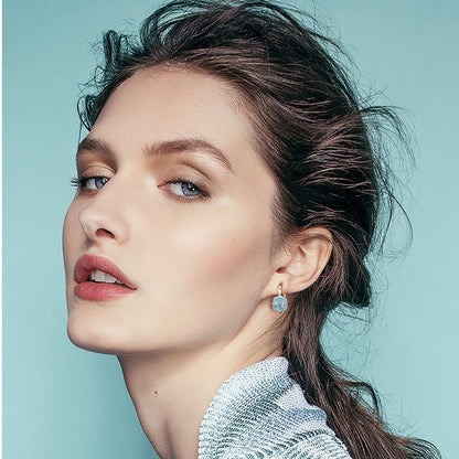 Aquamarine Earrings With a Woman