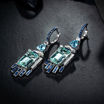 Aquamarine Hoop Earrings with black background