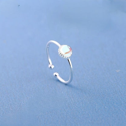 Blue Moonstone Ring with blue background