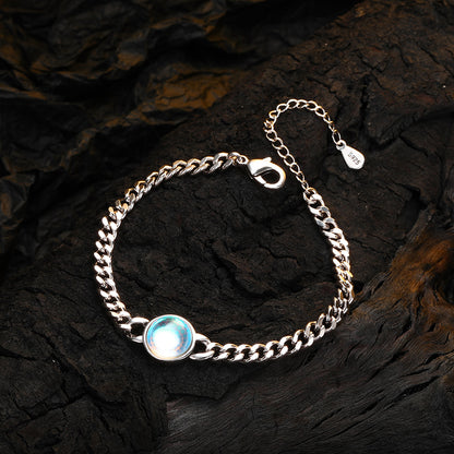 Moonstone bracelet on wooden.