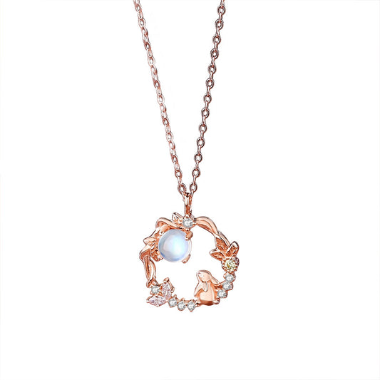 moonstone crystal necklace with white background