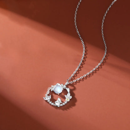 moonstone crystal necklace with On Table