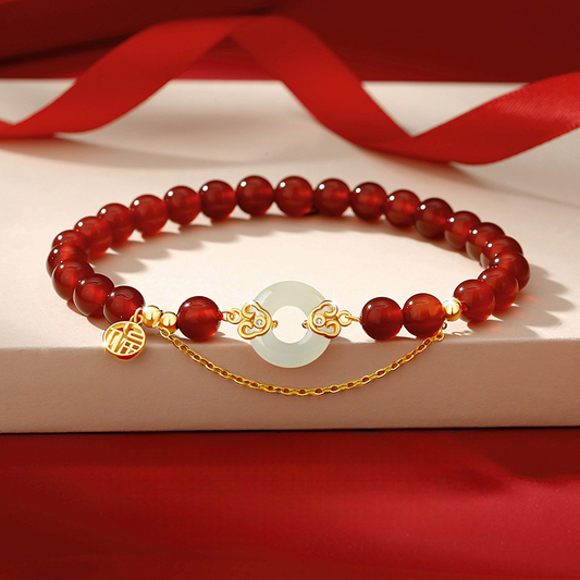 Red jade bracelet on the white box