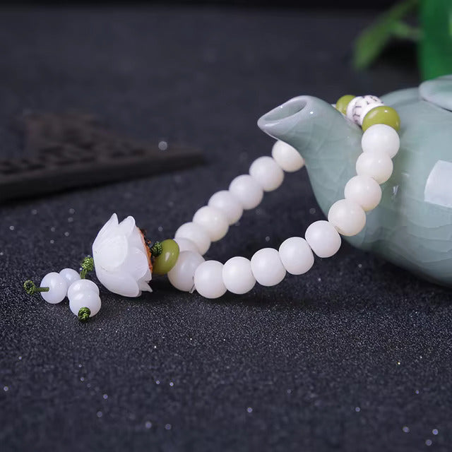 White Jade Bracelet With Lotus Charm